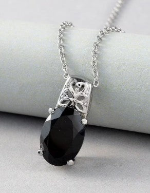 Oval cut Black Spinel Gemstone Intricate Pendant Necklace in Stainless Steel