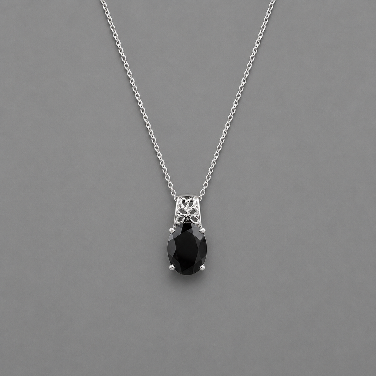 Oval cut Black Spinel Gemstone Intricate Pendant Necklace in Stainless Steel